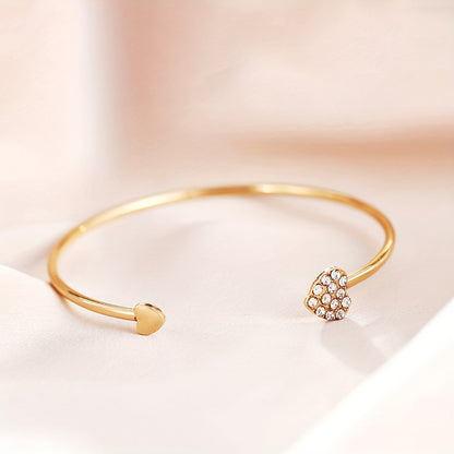 Chique stijve armband met hartmotief, verfraaid met fonkelende strass-steentjes
