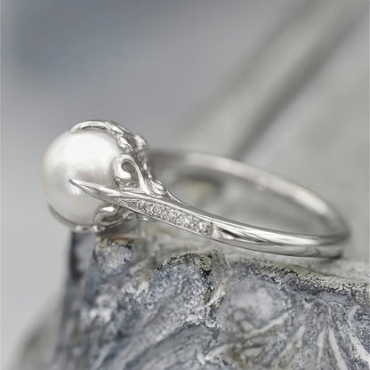 Ring met parel en kristallen