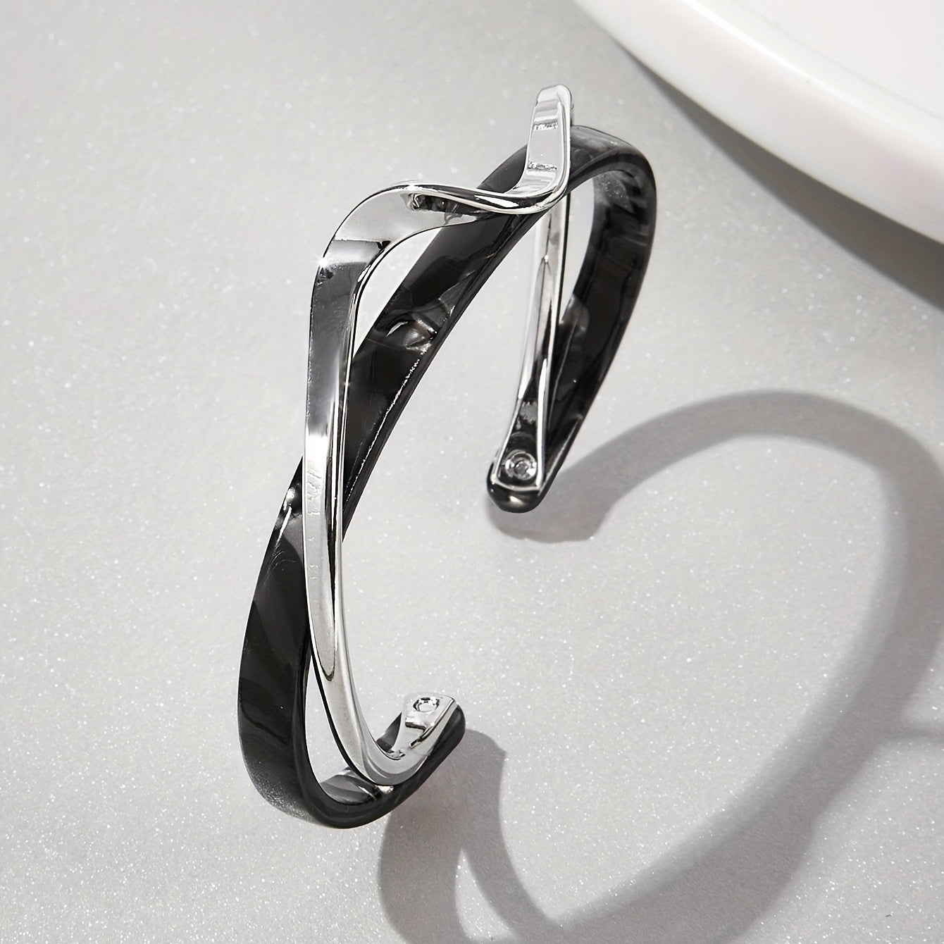 Stijve golfvormige armband verguld met 18K goud