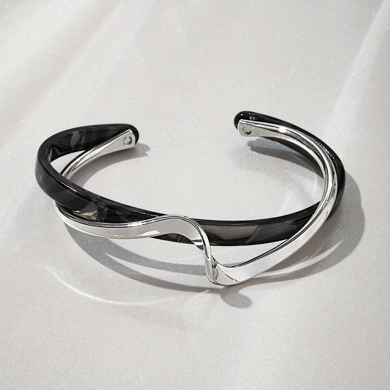 Stijve golfvormige armband verguld met 18K goud