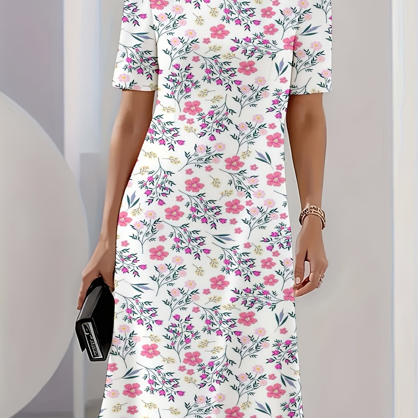 Jurk met wilde bloemen en groene takken