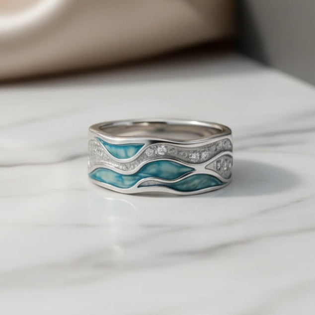 Zilveren ring met turquoise golven