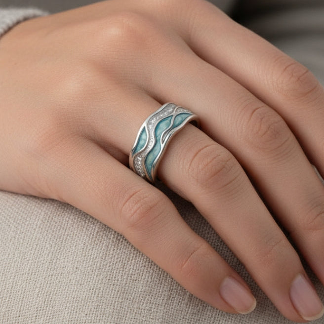 Zilveren ring met turquoise golven