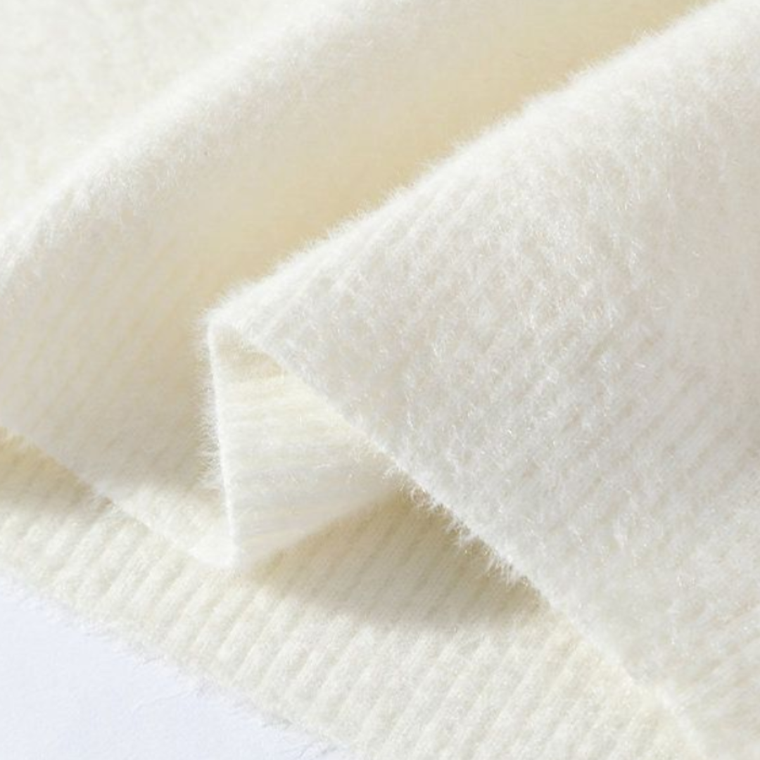 Faelan – Minimalistisk, varm striktrøje