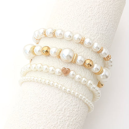 Set van 4 stapelbare armbanden met parels