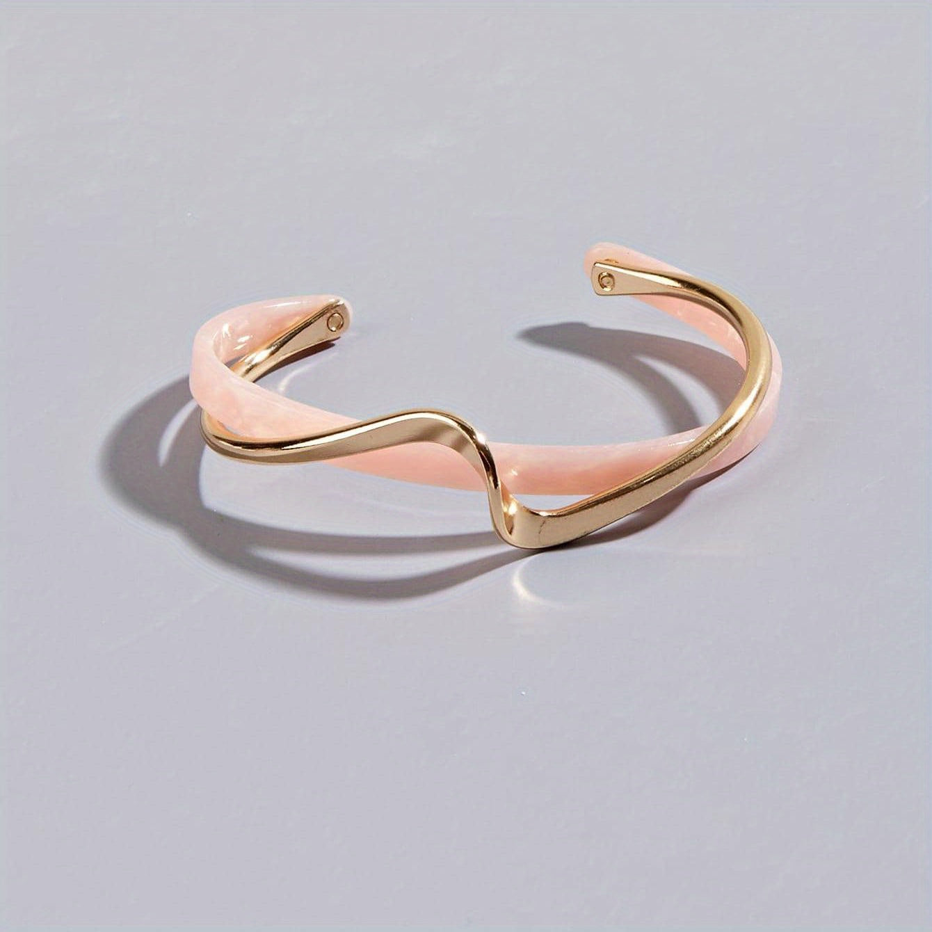 Stijve golfvormige armband verguld met 18K goud