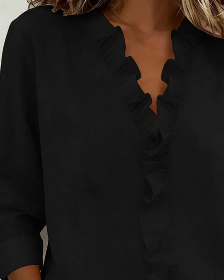 Susan | Blouse met volant, V-hals en lange mouwen