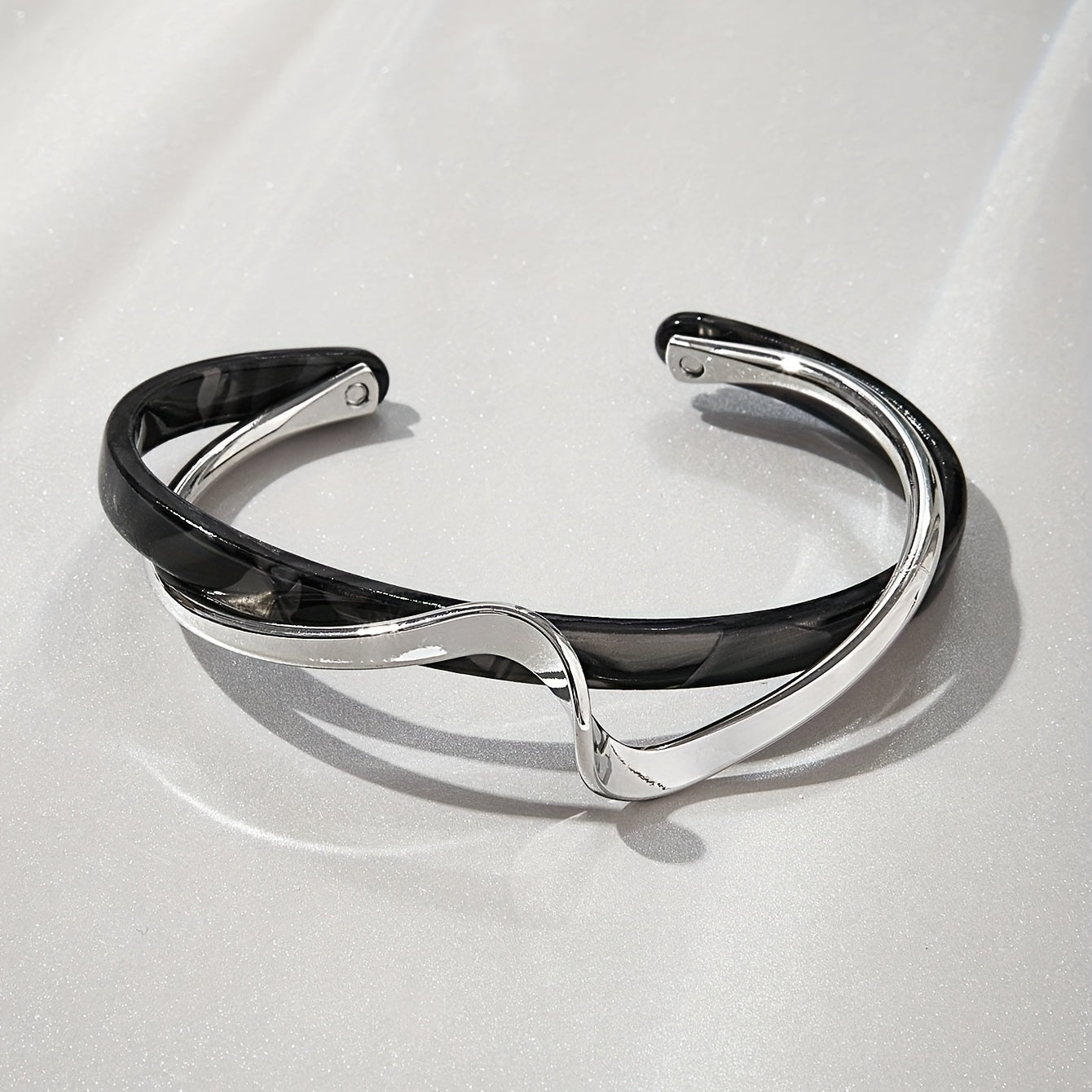 Stijve golfvormige armband verguld met 18K goud