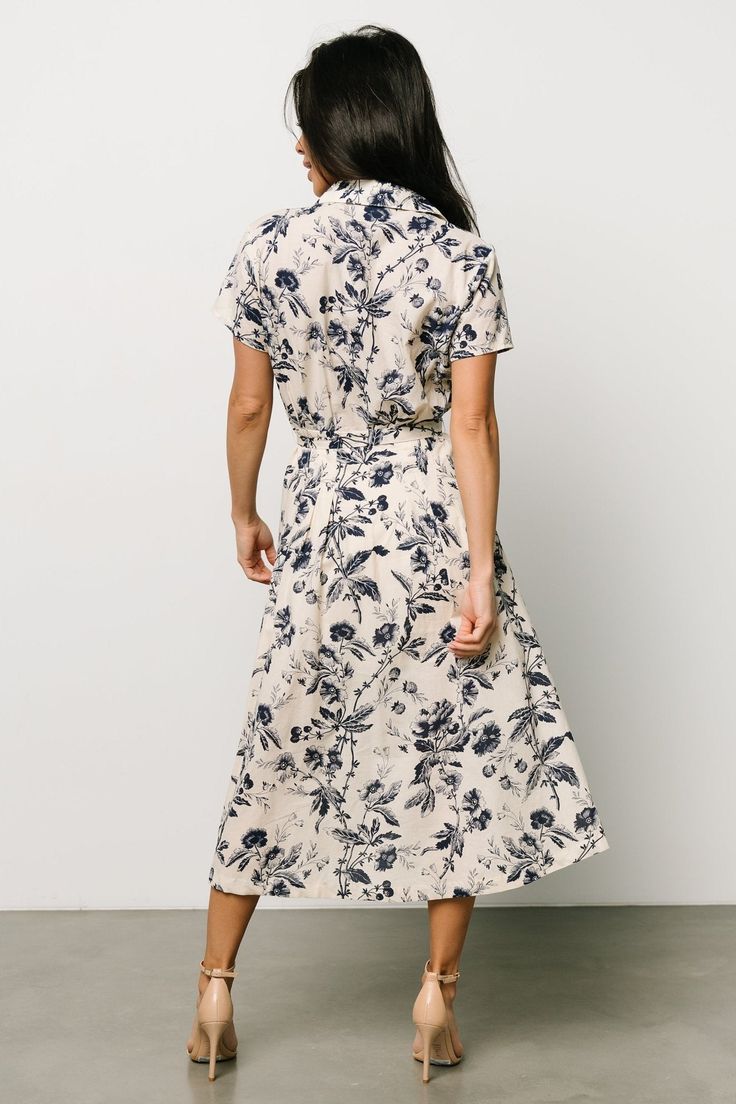 Halflange jurk met bloemenmotief